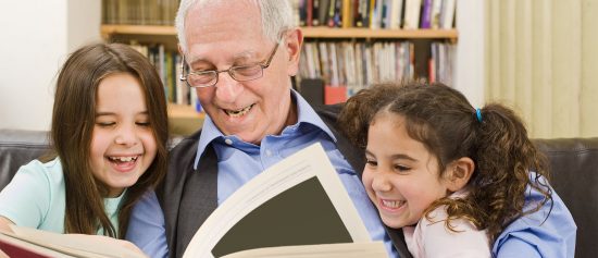 Grandpa Reading to Grandkids